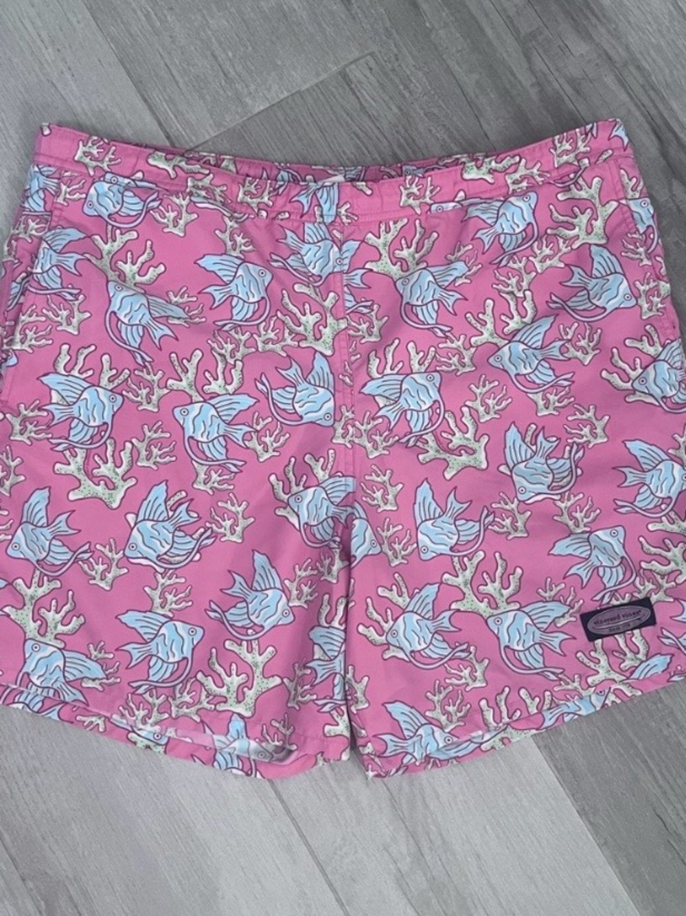 Vineyard Vines pink and blue men’s swim trunks.